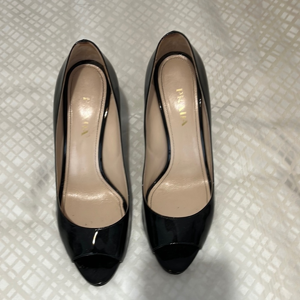 Prada black patent leather peep toe pumps